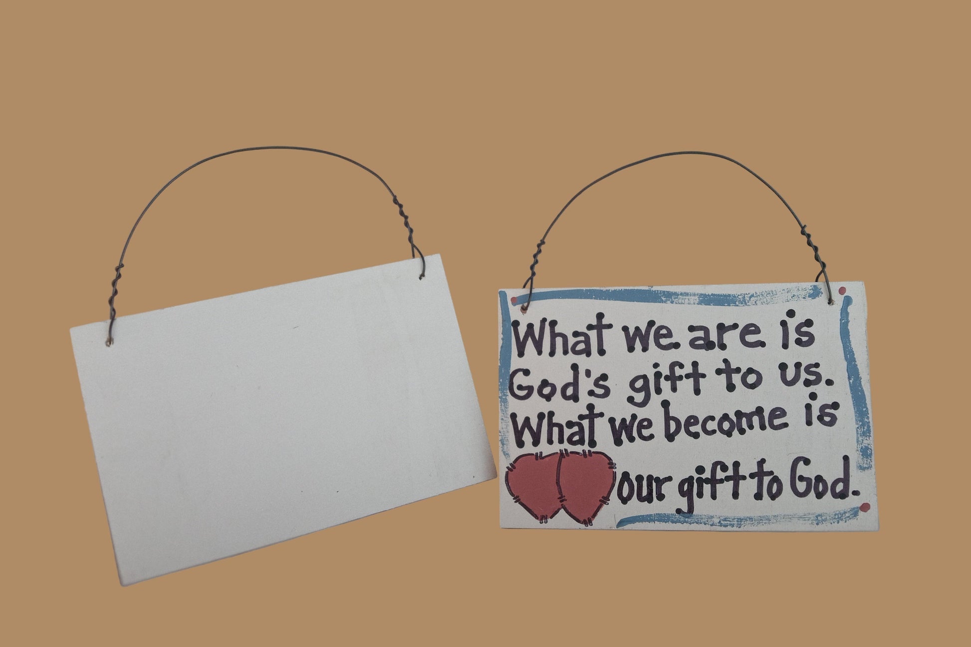What We Are wooden sign
