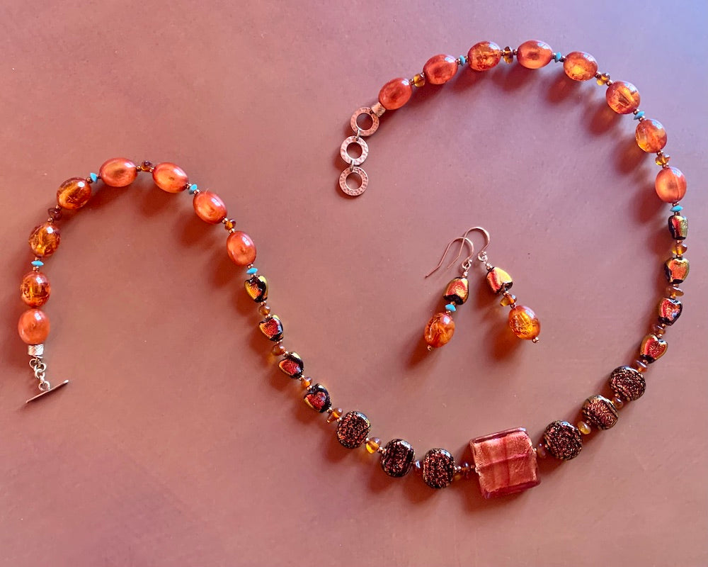 Necklace set | Sunset hues, Rufino Oro Italian rose gold focal bead, fiery orange red dichroic glass, vintage Lucite, amber, turquoise