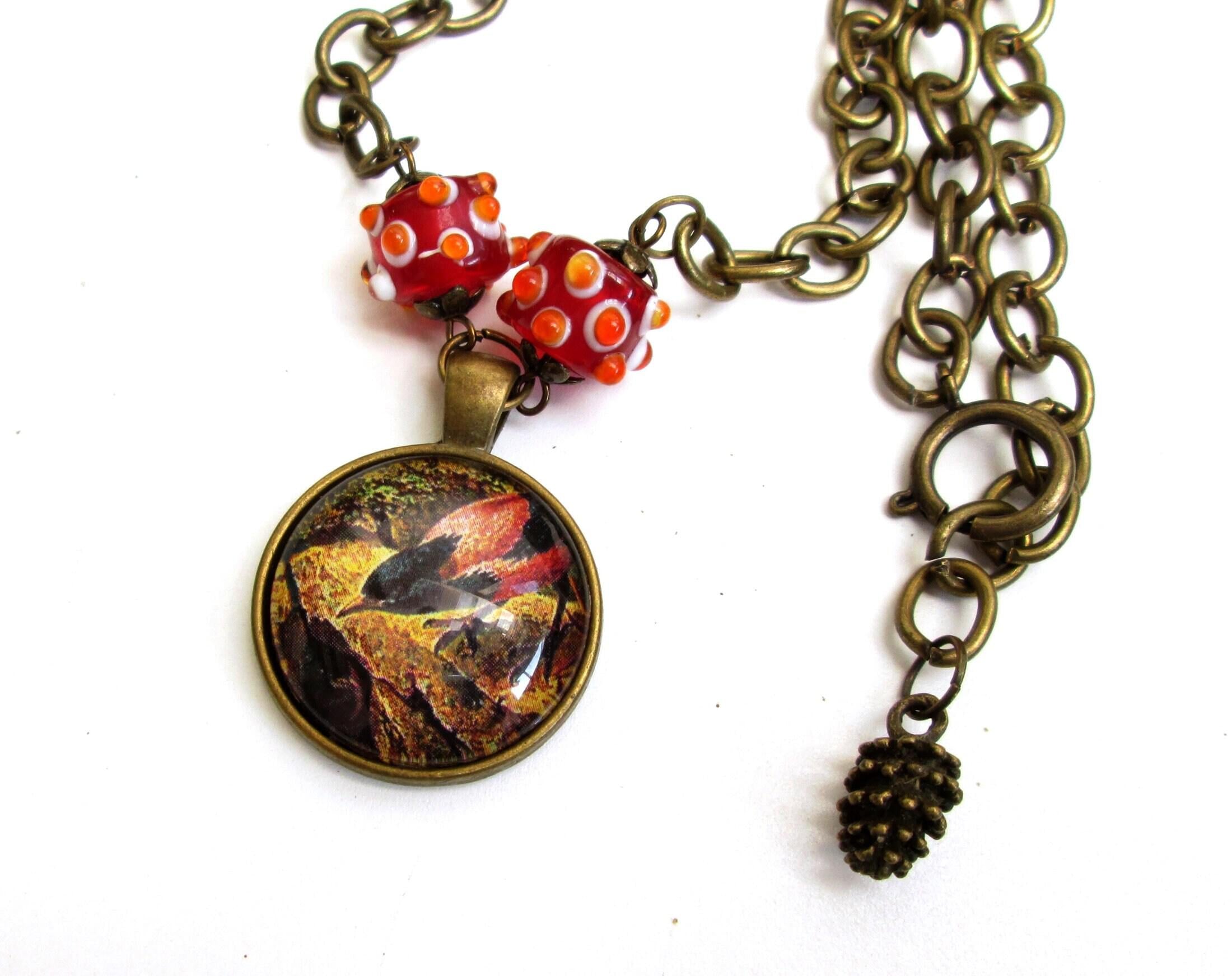 Colorful altered art bird pendant necklace for Fall, vintage style art pendant, vintage bird art necklace, pine cone charm, red and yellow